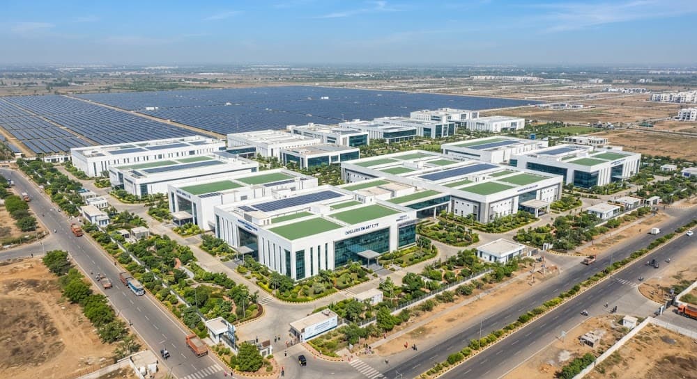 Industrial manufacturing pavilions beside a solar photovoltaic park